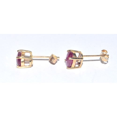 248 - 9ct gold oval cut Ruby stud earrings with gold posts 