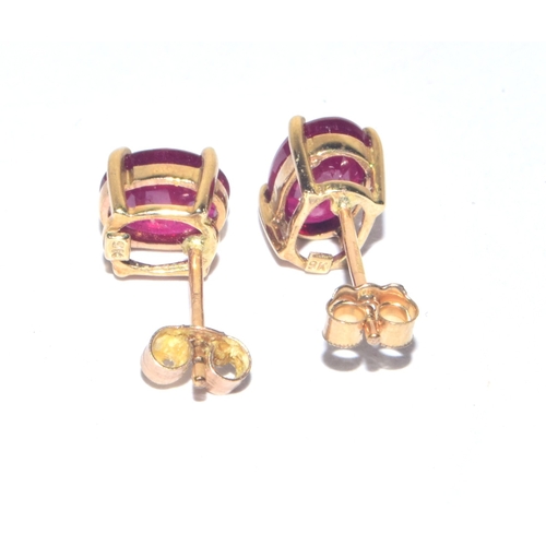 248 - 9ct gold oval cut Ruby stud earrings with gold posts 