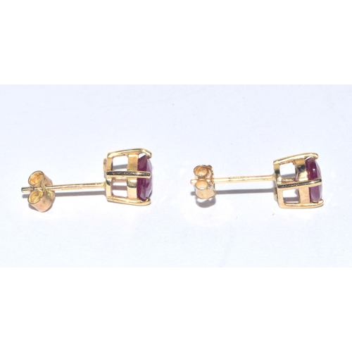 248 - 9ct gold oval cut Ruby stud earrings with gold posts 