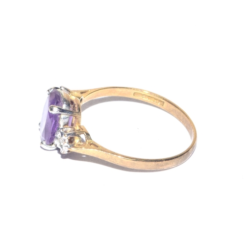 236 - 9ct gold vintage Amethyst and Diamond ring in a claw setting size M