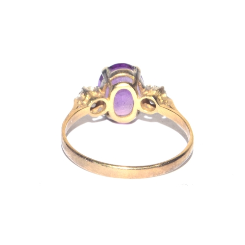 236 - 9ct gold vintage Amethyst and Diamond ring in a claw setting size M