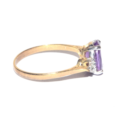 236 - 9ct gold vintage Amethyst and Diamond ring in a claw setting size M