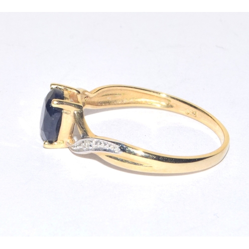 60 - 9ct gold ladies oval cut sapphire and Diamond shoulder ring size P