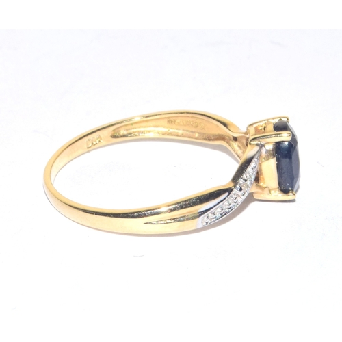 60 - 9ct gold ladies oval cut sapphire and Diamond shoulder ring size P