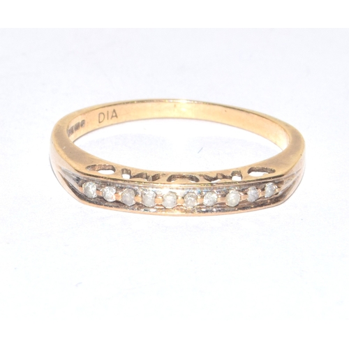 130 - 9ct gold ladies Diamond half eternity ring  with Diamond marked in the ring size N