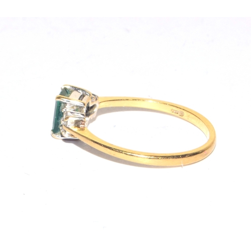 70 - 18ct gold ladies Emerald and Diamond ring the Emerald being oblong solitaire size M