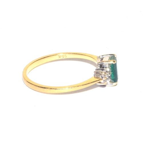 70 - 18ct gold ladies Emerald and Diamond ring the Emerald being oblong solitaire size M