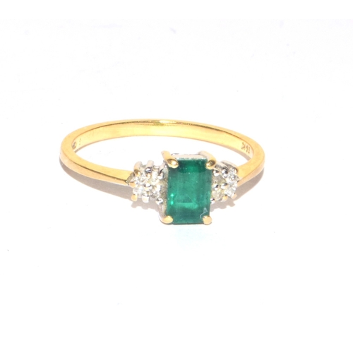 70 - 18ct gold ladies Emerald and Diamond ring the Emerald being oblong solitaire size M