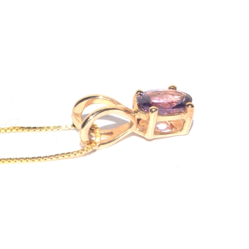 235 - 9ct gold oval cut Amethyst pendant necklace on a 9ct gold chain of 38cm