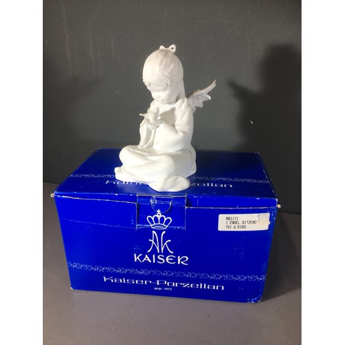 117 - Kaiser Porcelain Bisque Boxed Angel No 721 and Two Kaiser Bisque Dolphin Statues No's 509 & 654