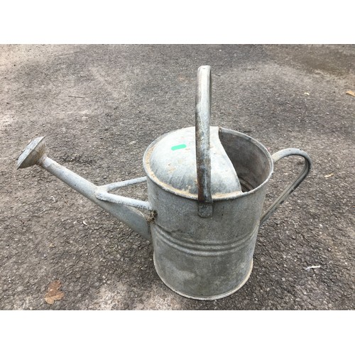 394 - 10 Gallon Lidded Milk Churn Stamped Torrington and 3 x Galvanized Watering Cans.