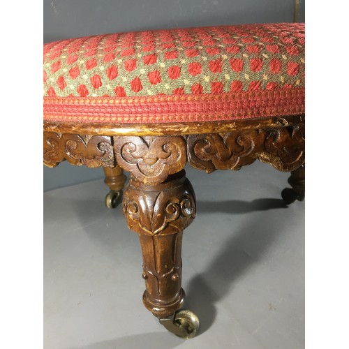 358 - Early 20th Century Circular Footstool Having 3 Carved Legs terminating in Brass Castors.H 29cm x Dia... 