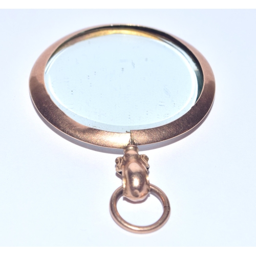 204 - Antique large 9ct gold photo locket measuring not including the bale 3.7cm, 7.9grams 