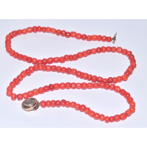 264 - Antique undyed red coral bead necklace with a tested as 9ct gold mourning clasp 52cm long 22.9grams&... 