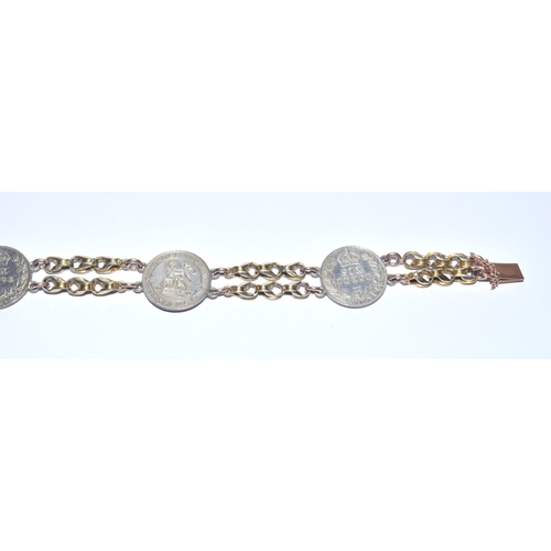 34 - Antique enamelled silver six pence and tests as a minimum 9ct solid gold bracelet 19cm long 22 grams... 