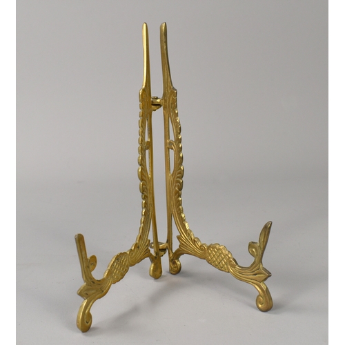 207 - A collection of vintage brass items.Including an 'Elephant' letter opener, plate stand, vase and can... 