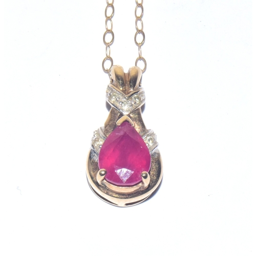 193 - 9ct gold Diamond and Ruby pendant necklace on a 40cm 9ct gold chain