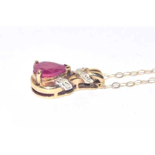 193 - 9ct gold Diamond and Ruby pendant necklace on a 40cm 9ct gold chain