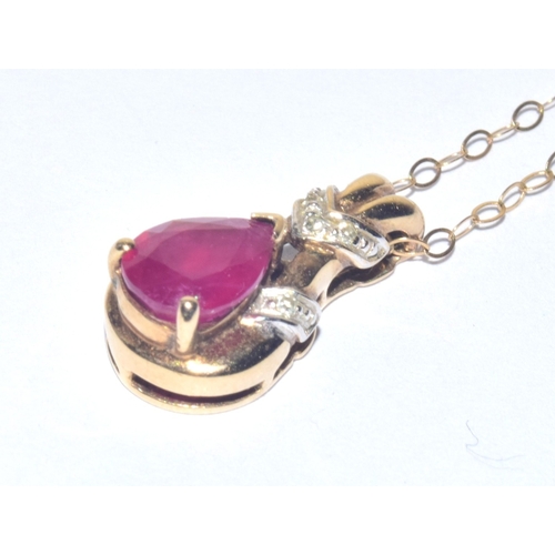 193 - 9ct gold Diamond and Ruby pendant necklace on a 40cm 9ct gold chain