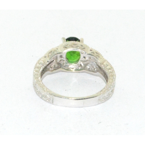 109 - 10ct white gold Tourmaline and Diamond dress ring size P