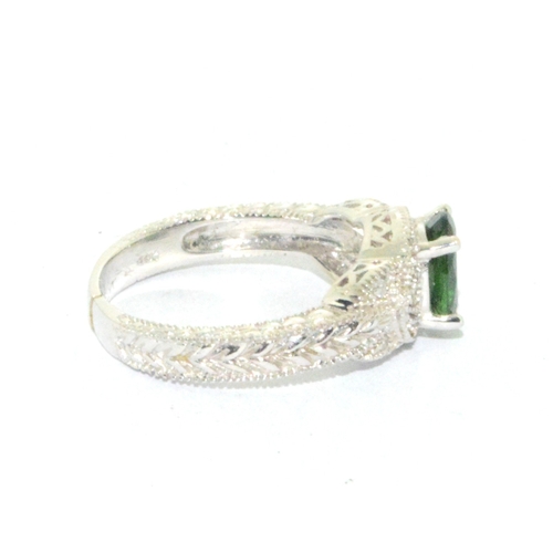 109 - 10ct white gold Tourmaline and Diamond dress ring size P