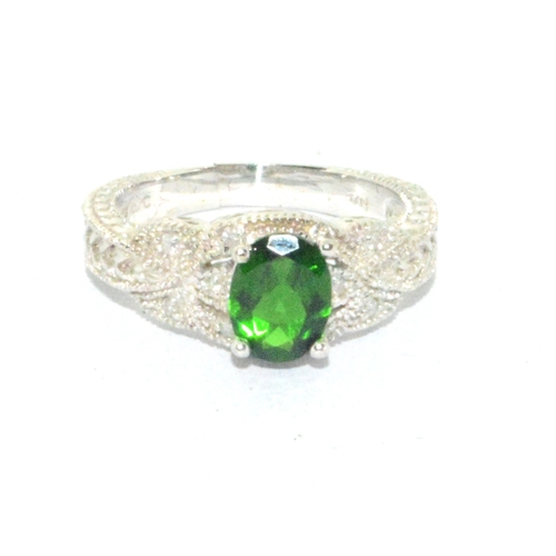 109 - 10ct white gold Tourmaline and Diamond dress ring size P