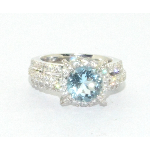 250 - A very Impressive 18ct white gold Aquamarine and Diamond cluster ring size K