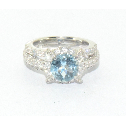 250 - A very Impressive 18ct white gold Aquamarine and Diamond cluster ring size K