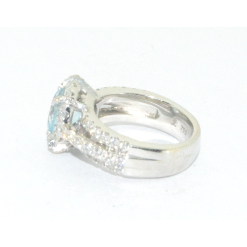 250 - A very Impressive 18ct white gold Aquamarine and Diamond cluster ring size K