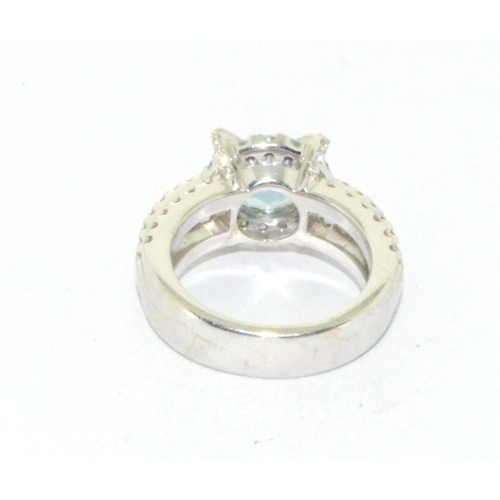 250 - A very Impressive 18ct white gold Aquamarine and Diamond cluster ring size K