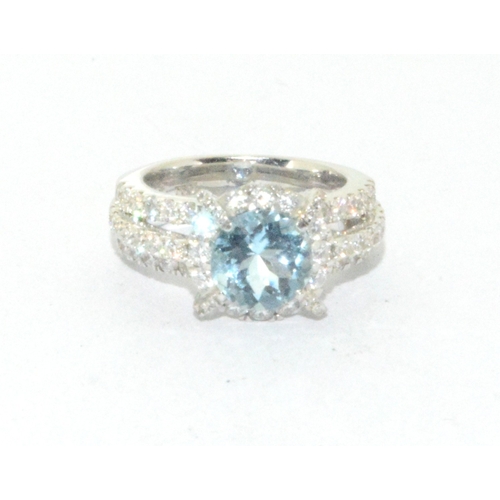 250 - A very Impressive 18ct white gold Aquamarine and Diamond cluster ring size K