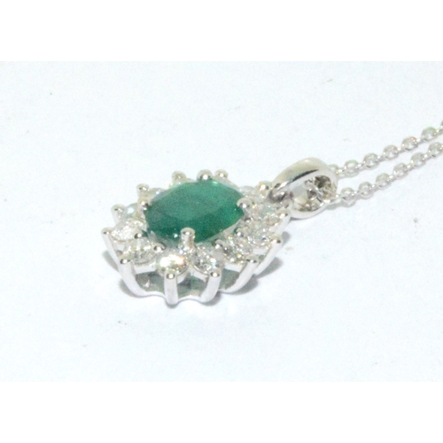 299 - 18ct white gold Emerald and Diamond pendant necklace of approx 1.2cts 