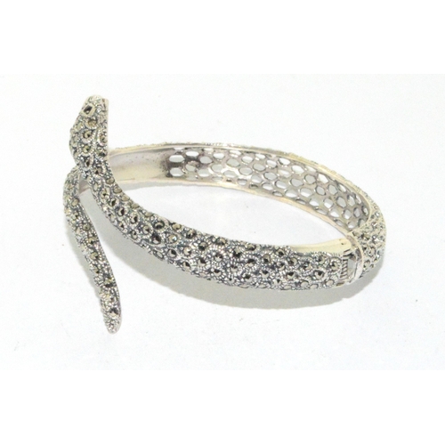 39 - Silver and CZ Snake bangle with sapphire eyes