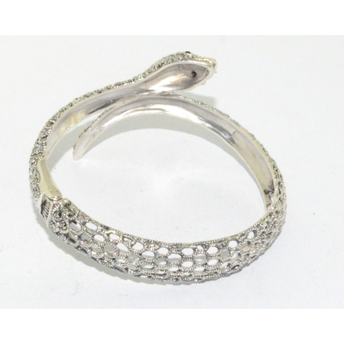 39 - Silver and CZ Snake bangle with sapphire eyes