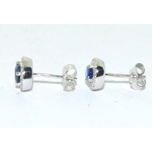 69 - Pair of 18ct white gold Sapphire and Diamond stud cluster earrings 0f approx 1.25cts 