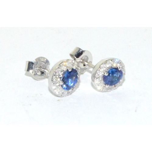 69 - Pair of 18ct white gold Sapphire and Diamond stud cluster earrings 0f approx 1.25cts 