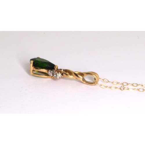 258 - 9ct gold Diamond and pear cut Diopside pendant necklace on a 9ct gold chain of 38cm