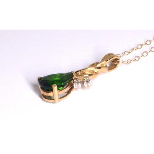 258 - 9ct gold Diamond and pear cut Diopside pendant necklace on a 9ct gold chain of 38cm