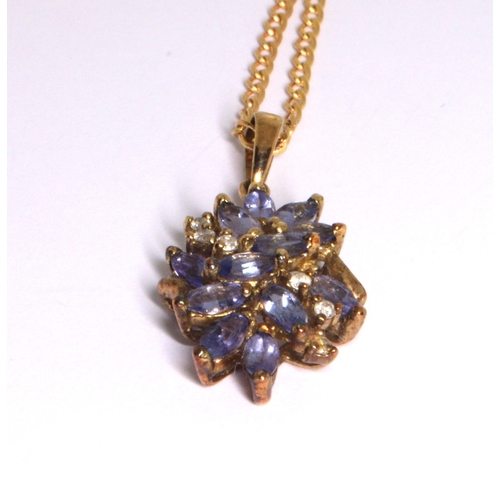 118 - 9ct gold Tanzanite and Diamond cluster pendant necklace on a 9ct gold chain of 40cm