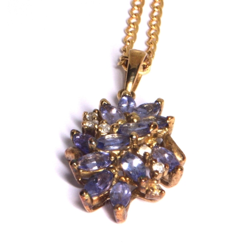 118 - 9ct gold Tanzanite and Diamond cluster pendant necklace on a 9ct gold chain of 40cm