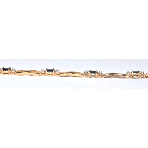 138 - 9ct gold Diamond and Sapphire line bracelet of 17cm long hall marked as diamond