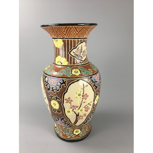 81 - Large Oriental Enamel Bamboo Decorated Earthen Ware Vase.H 52cm