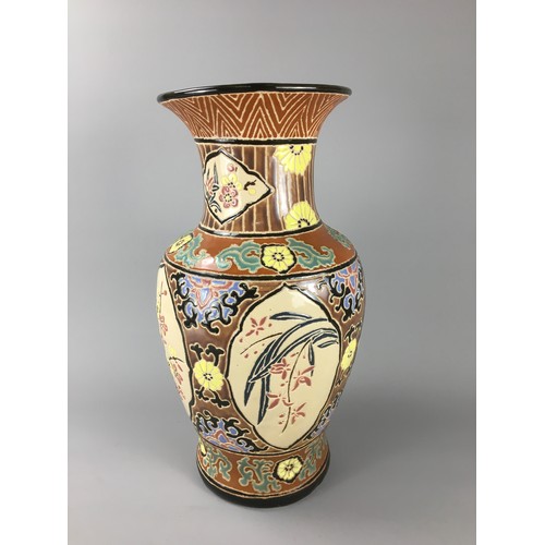 81 - Large Oriental Enamel Bamboo Decorated Earthen Ware Vase.H 52cm