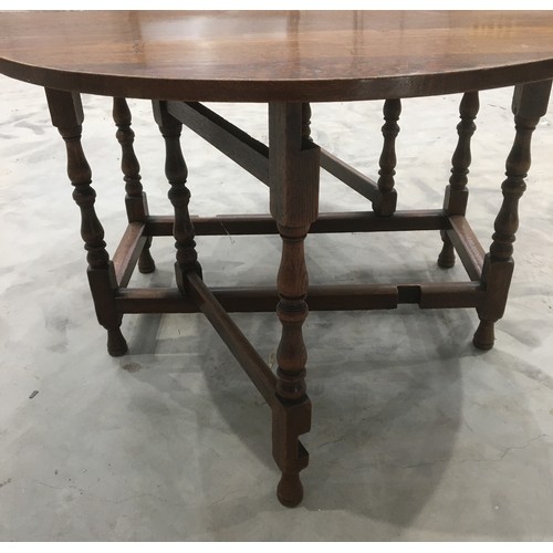 351 - Nice sized early 20th Century Oak Gate leg Table.  Approx. size: Height 72.5, Width 106, Length 49, ... 