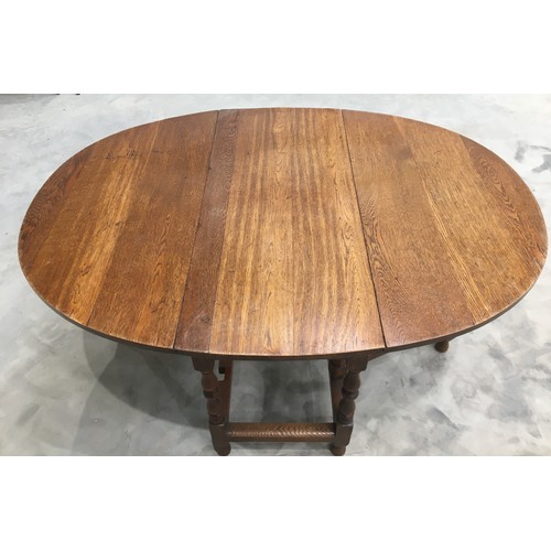 351 - Nice sized early 20th Century Oak Gate leg Table.  Approx. size: Height 72.5, Width 106, Length 49, ... 