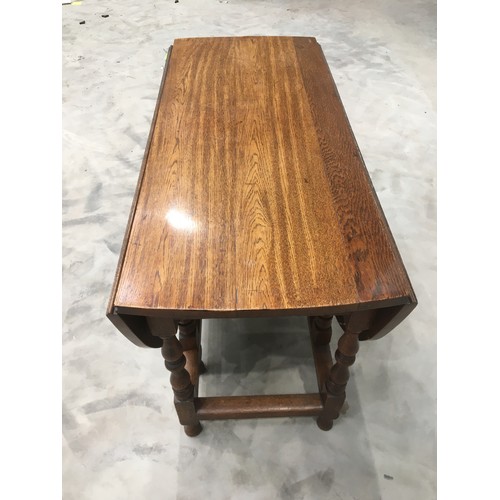 351 - Nice sized early 20th Century Oak Gate leg Table.  Approx. size: Height 72.5, Width 106, Length 49, ... 