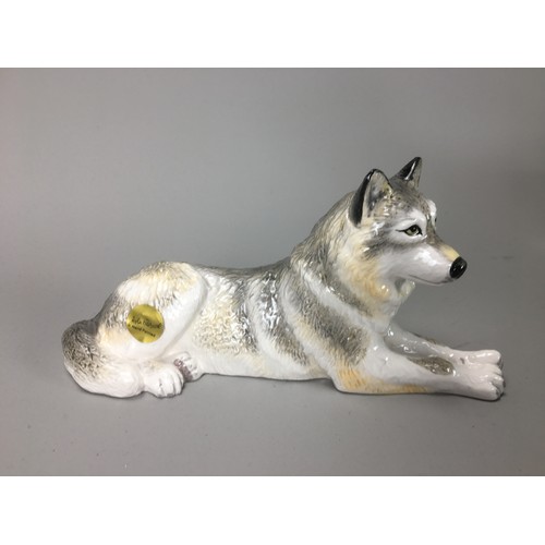 30 - John Beswick Wolf Figurines Boxed - Walkin Wolf JBDW3, Lying Wolf JBDW4, Howling Wolf JBDW2.