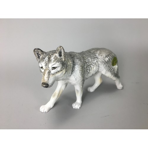 30 - John Beswick Wolf Figurines Boxed - Walkin Wolf JBDW3, Lying Wolf JBDW4, Howling Wolf JBDW2.