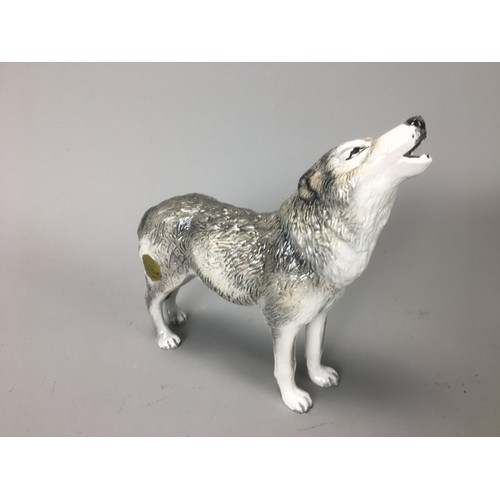 30 - John Beswick Wolf Figurines Boxed - Walkin Wolf JBDW3, Lying Wolf JBDW4, Howling Wolf JBDW2.