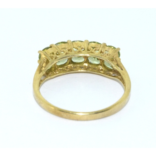 168 - 9ct gold ladies vintage twin row Peridot with accent Diamond hall marked in the ring held in a box s... 